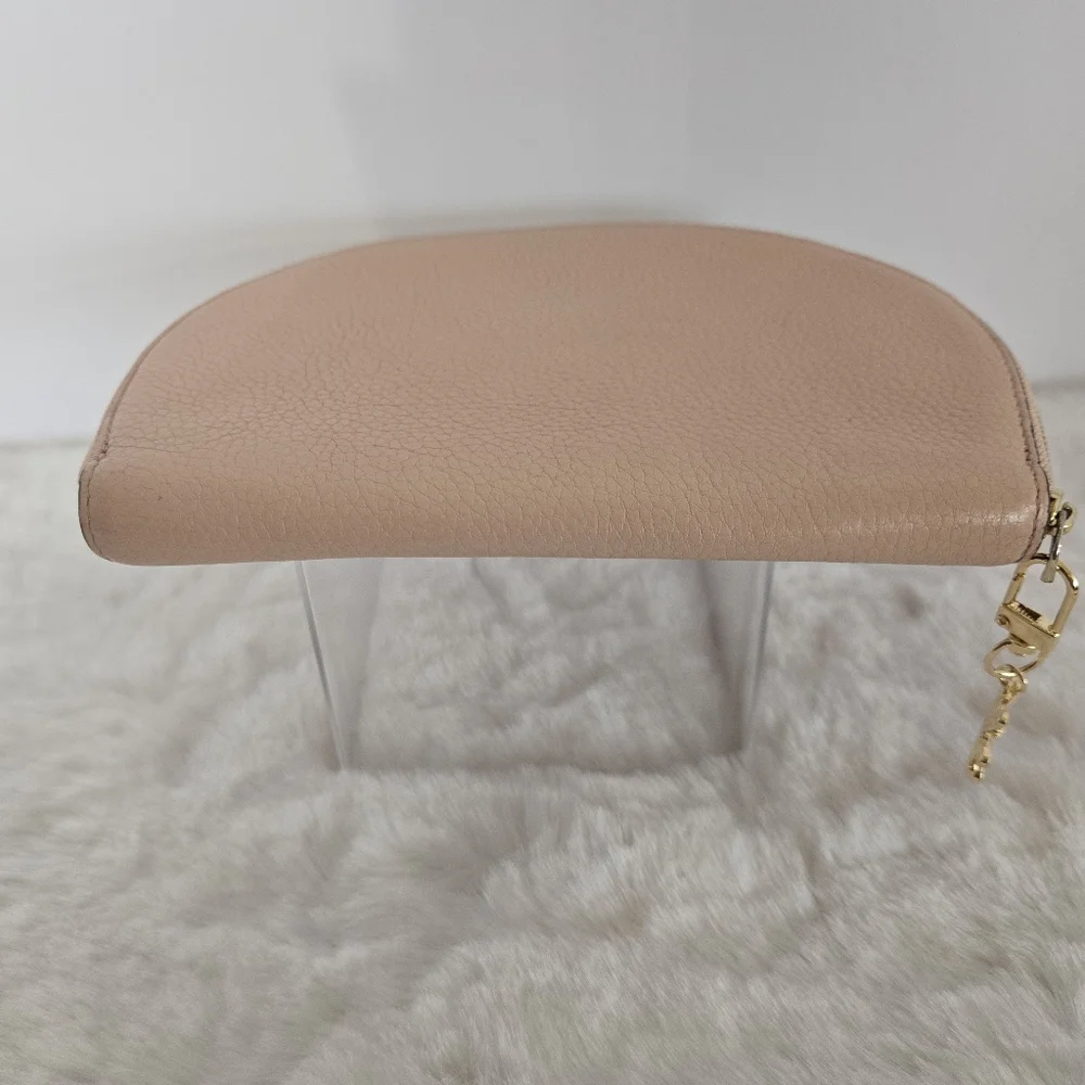Kate Spade Light Pink Pebbled Leather Jackson Street Half Moon Women's Wristlet
